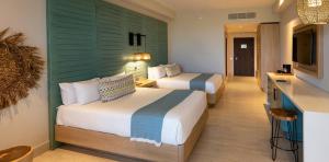 habitacion-junior-suite-tropical-versión-queen-lopesan-costa-bavaro-resort-spa-casino-punta-cana