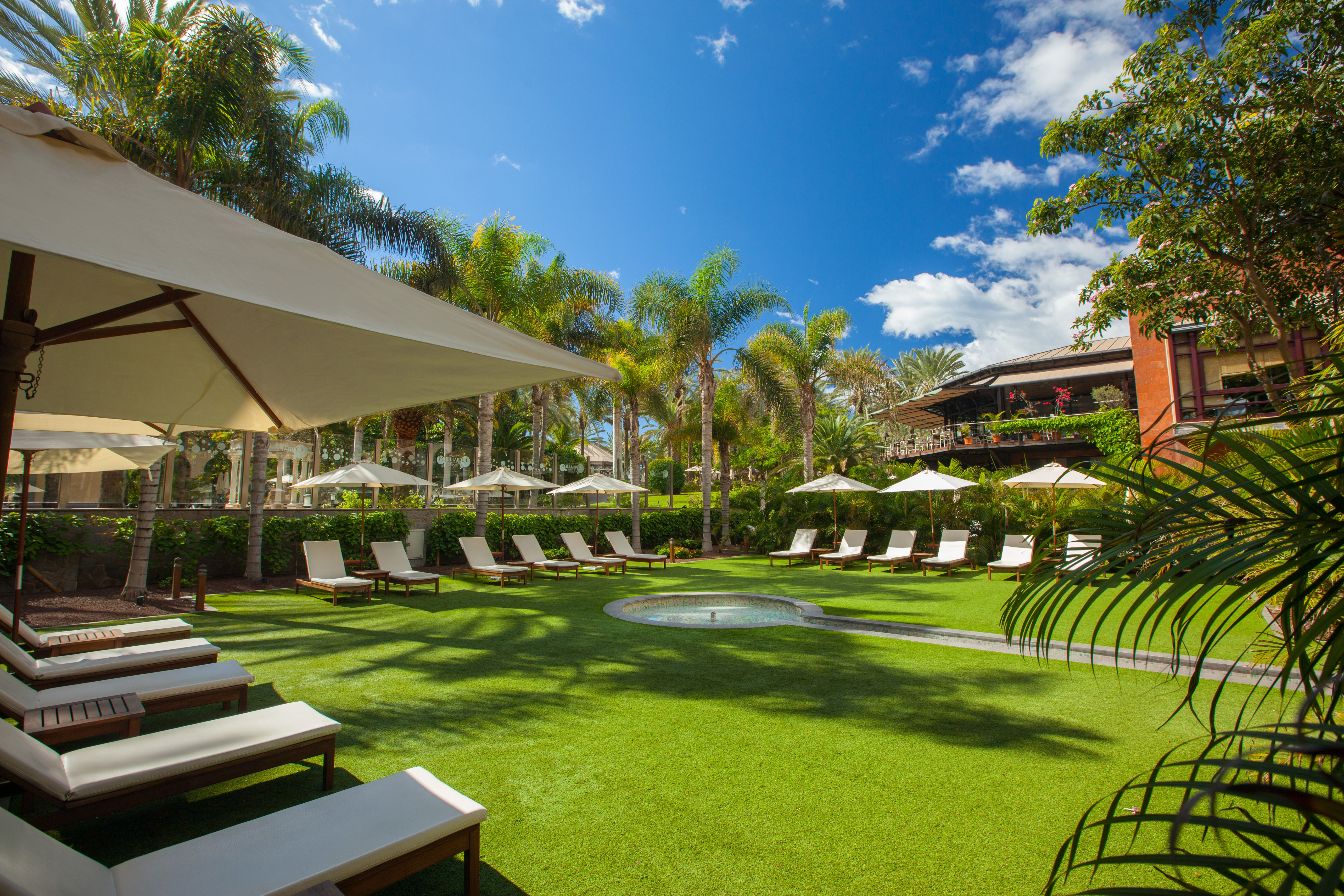 hotel lopesan costa meloneras fotos zona piscina comunitaria