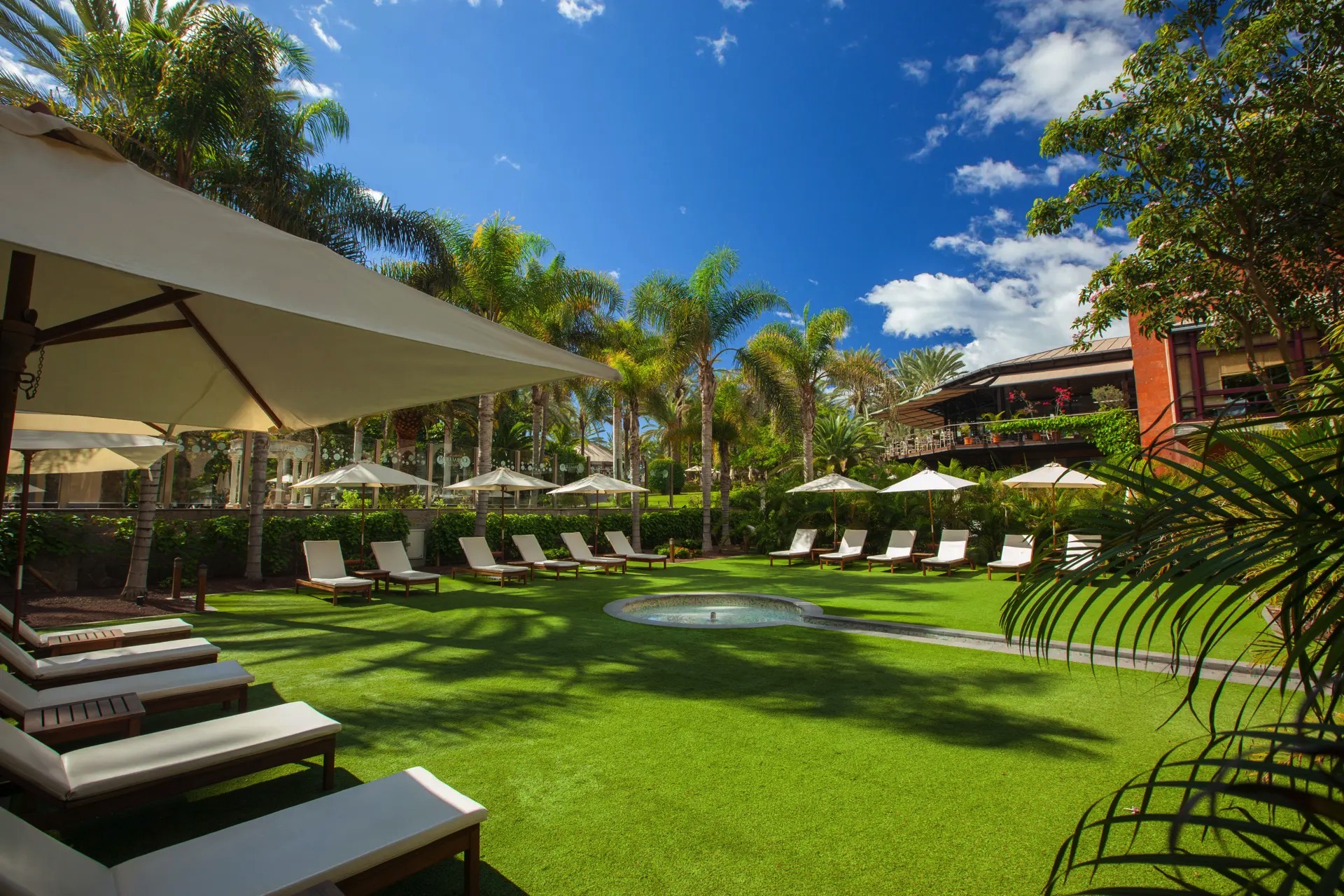 hotel lopesan costa meloneras fotos zona piscina comunitaria