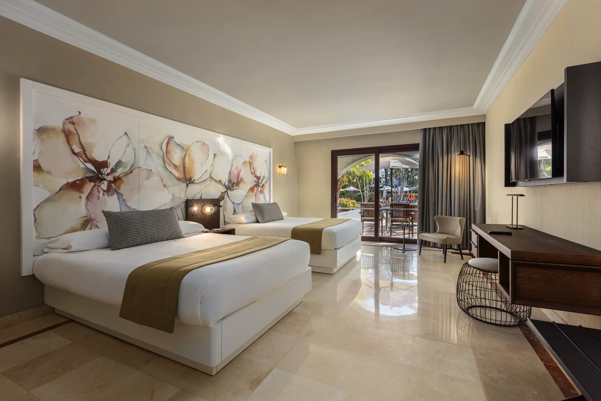 habitación unique premium pool lopesan costa meloneras resort & spa