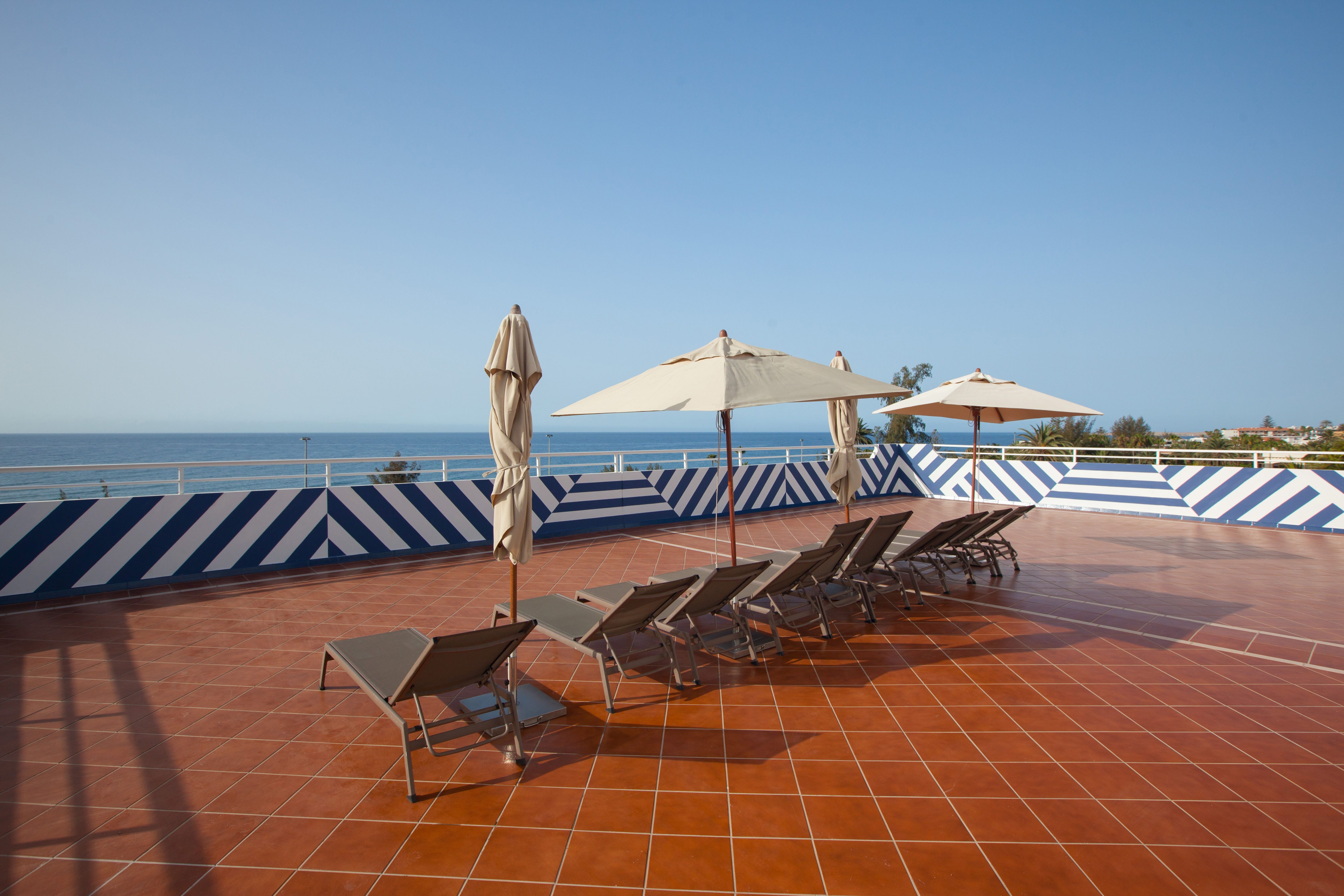 photos corallium beach by lopesan hotels solarium