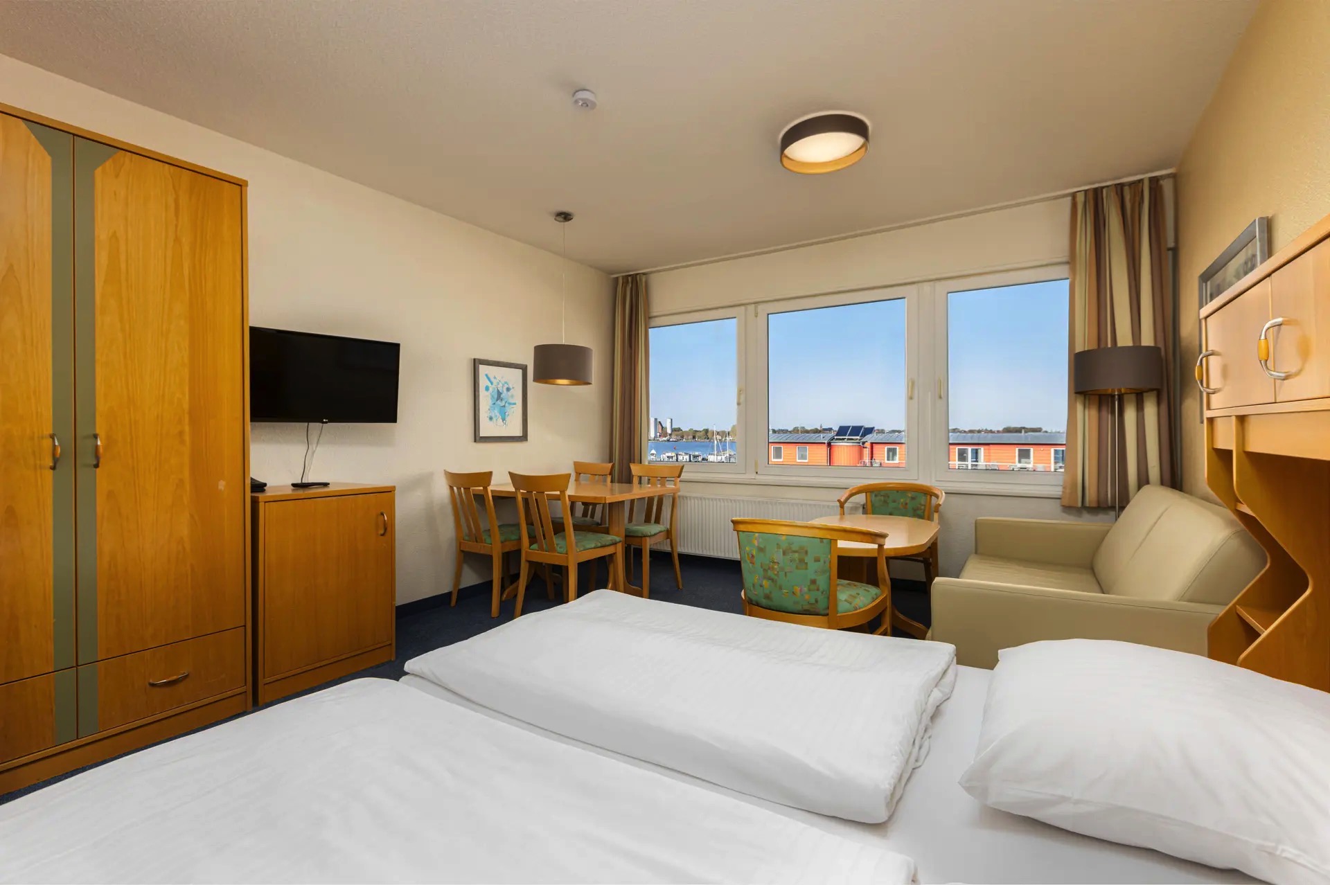 fotos cama apartamento yachthafen habitaciones hotel ifa fehmarn