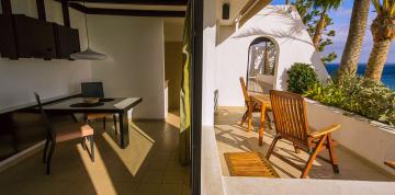 	Interior and exterior of the Superior Double bungalow magnifique at IFA Villas Altamarena	