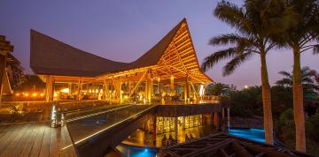 	Lodge at the hotel Lopesan Baobab Resort lit up	