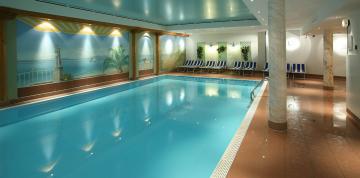 	Swimming pool in the wellness centre at the IFA Alpenrose Hotel	