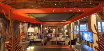 	Lounge of the Royal Suite at the Lopesan Baobab Resort lit up	