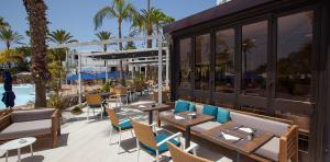 Tables in the Corallium Beach by Lopesan Hotels buffet