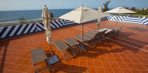 Terraza solarium del Corallium Beach by Lopesan Hotels
