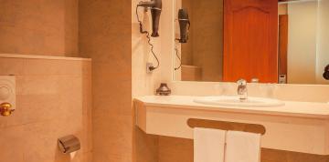 	Interior image of the bathroom seen at the IFA Altamarena Hotel Double Standard room	