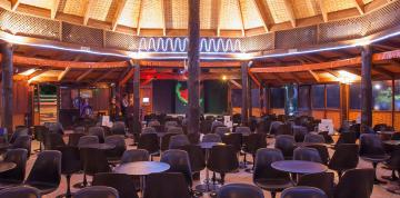 	Lounge bar illuminated at the IFA Altamarena Hotel	