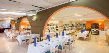 	Tables and chairs in the IFA Altamarena Hotel buffet	