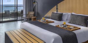 room-service-breakfast-junior-suite-bed-hotel-faro-a-lopesan-collection-hotel-gran-canaria
