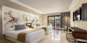 habitacion-unique-premium-pool-lopesan-costa-meloneras-resort-spa-gran-canaria