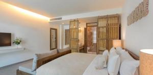 interior-habitacion-deluxe-eden-beach-a-lopesan-collection-hotel-khao-lak-tailandia	
