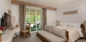 terrace-deluxe-room-eden-beach-a-lopesan-collection-hotel-khao-lak-thailand	