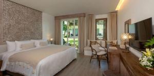 room-tropical-garden-eden-beach-a-lopesan-collection-hotel-khao-lak-thailand	