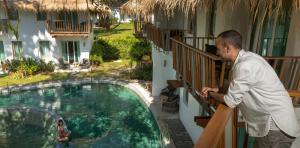 aussenzimmer-grand-deluxe-lagoon-pool-view-eden-beach-a-lopesan-collection-hotel-khao-lak-thailand	